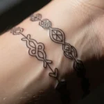27 Bracelet Tattoos That Add Ancient Symbolism