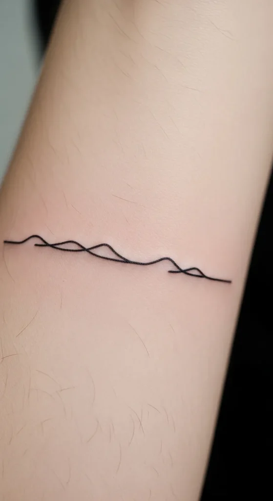 Simple Meadow Line Tattoo